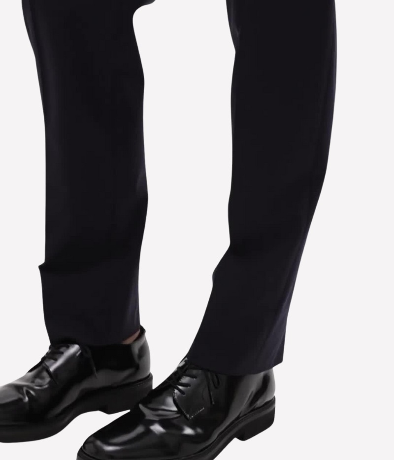 Mayer Trouser by Theory, crafted from medium-weight Italian virgin wool and Lycra Spandex. Features straight slim leg with subtle pressed creases, side slip pockets, back welt pockets, and hook-and-zip closure. Wrinkle-resistant and moisture-controlling fabric for all-day polish