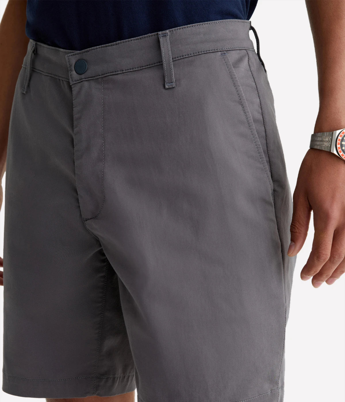 Close-up of the AG Wanderer Shorts, showing fine stitching, tailored pocket detailing, and smooth cotton fabric texture.