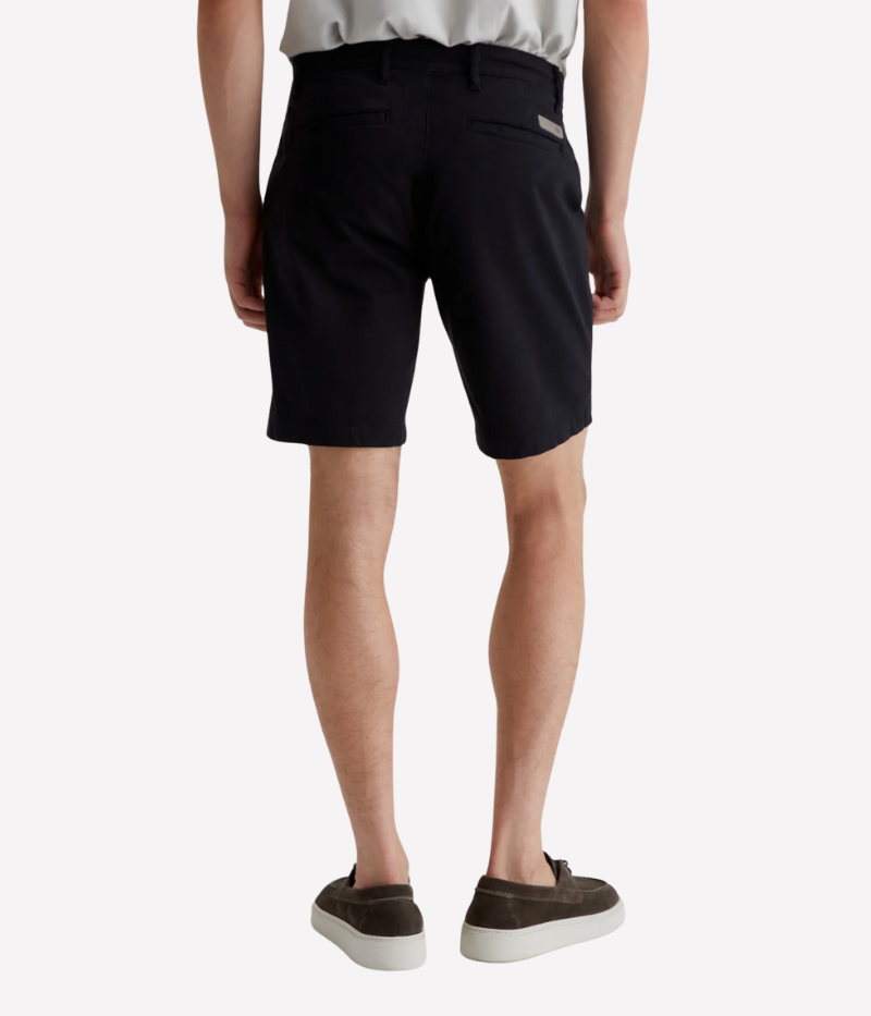 Men’s slim-fit black shorts with a clean, tailored finish, crafted from soft Brighton Sueded Sateen. Lightweight with a slight stretch for comfort, these versatile shorts are perfect for polished yet relaxed styling.